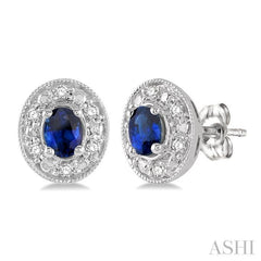 4x3 MM Oval Shaped Sapphire and 1/10 Ctw Round Cut Diamond Earrings in 14K White Gold