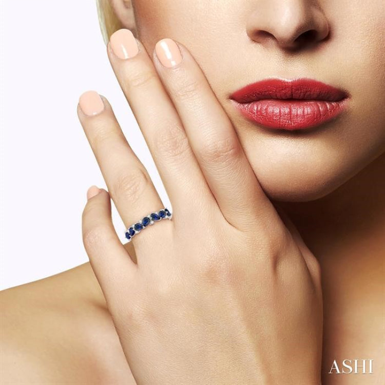 4x3 MM Pear Shape Sapphire and 1/6 Ctw Round Cut Diamond Precious Band in 14K White Gold