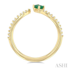 4X3 MM Oval Cut Emerald and 1/10 Ctw Petite Round Cut Diamond Precious Fashion Ring in 10K Yellow Gold