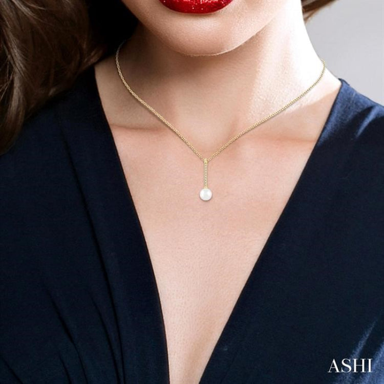 7 MM Round Shape Cultured Pearl and 1/10 Ctw Petite Round Cut Diamond Fashion Pendant With Chain in 10K Yellow Gold
